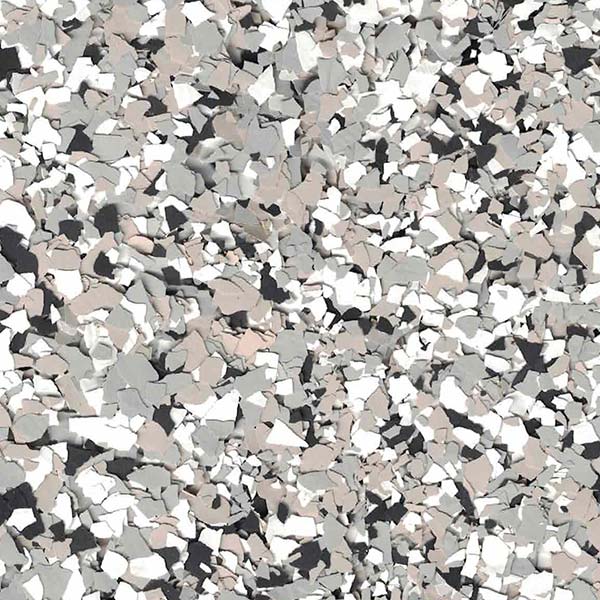 The image shows a close-up of a terrazzo floor with a mix of grey, white, and black chips, providing a textured, speckled appearance.