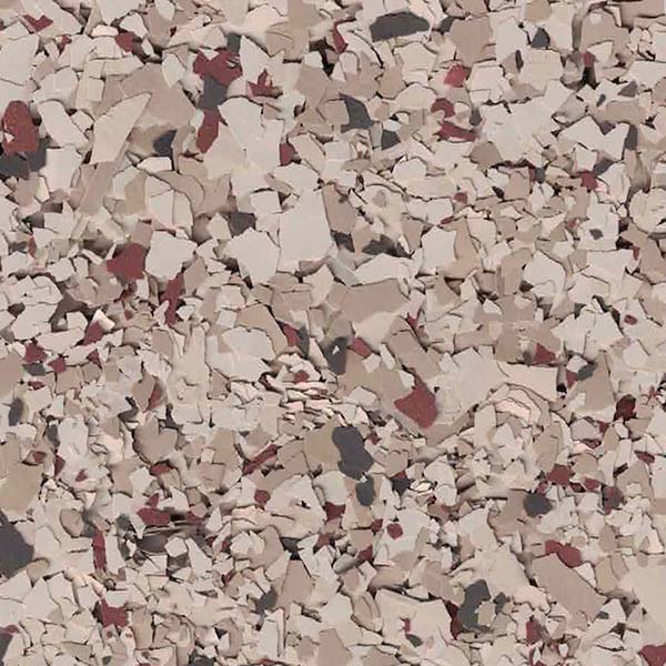 A close-up image of a textured surface with beige, black, and red fragmented patterns, resembling a decorative stone or flake floor coating.