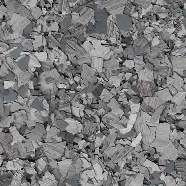 The image displays a close-up view of gray terrazzo flooring with a mix of variously sized and shaped fragments, creating a textured pattern.