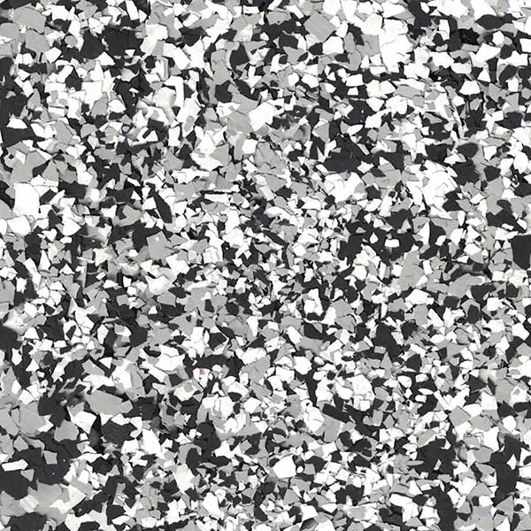 The image displays a random pattern of black, white, and gray flecks closely resembling a terrazzo floor or an abstract mosaic.