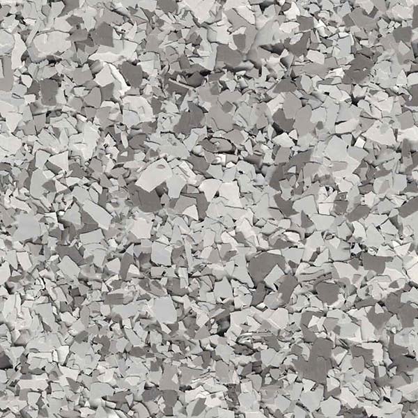 A close-up image showing numerous small, irregularly-shaped gray and white stones scattered densely together. There are no people, landmarks, or buildings visible.