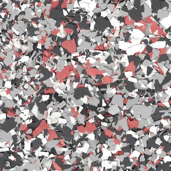 The image shows a colorful abstract pattern consisting of randomly scattered pieces in red, gray, black, and white, resembling terrazzo flooring.