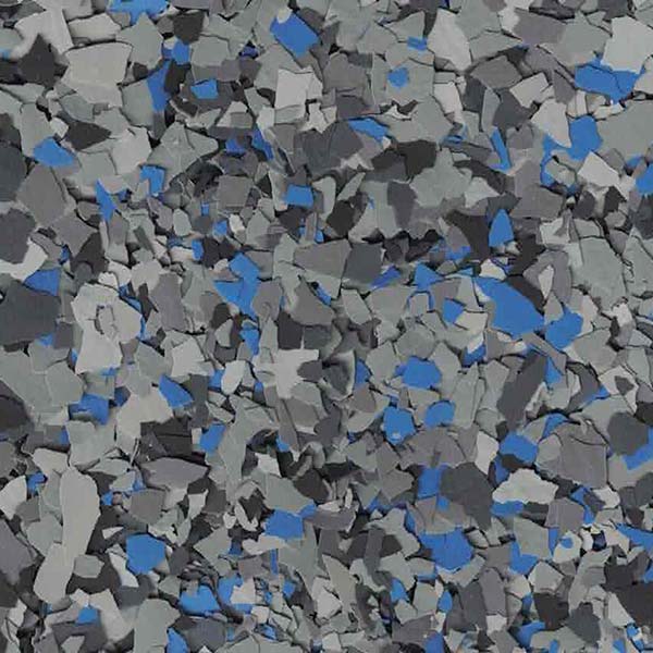 An abstract pattern with blue, grey, and black irregular pieces forming a chaotic, mosaic-like texture, resembling chipped stone or terrazzo flooring.