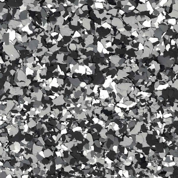 The image displays a close-up of a black, white, and grey textured pattern resembling a terrazzo-style surface, with no recognizable landmarks or buildings.